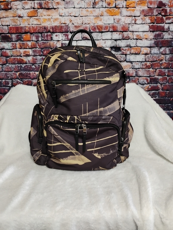 Tumi Handbags - TUMI Voyageur Carson Backpack Nylon Leather ~Lines Print~ EUC